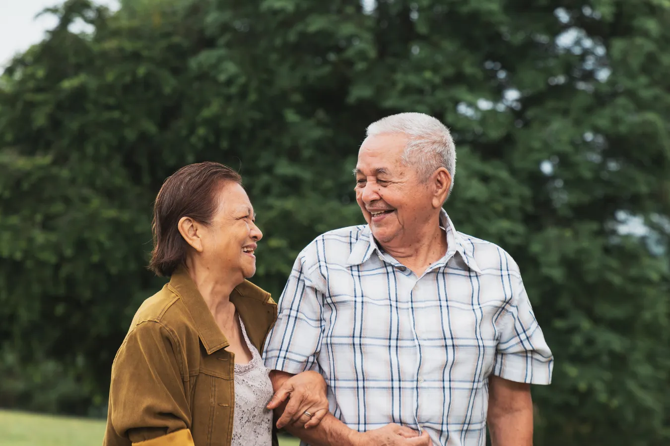 Older couple smiling at each other